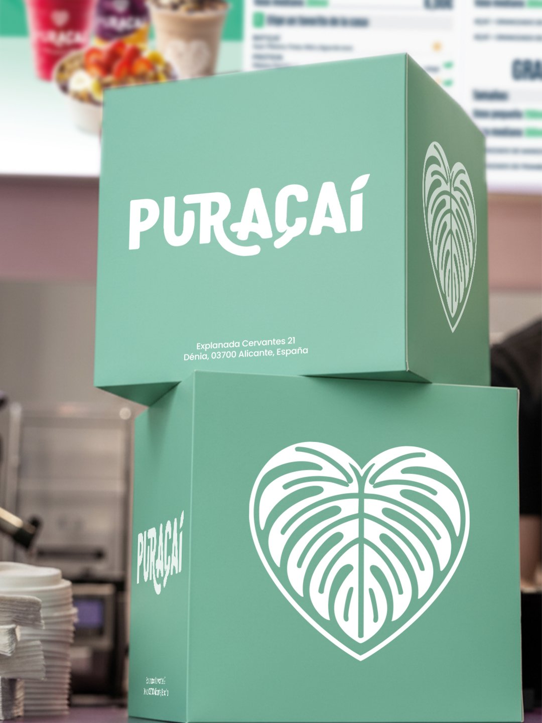 Cajas de Puraçaí con logotipo e isotipo