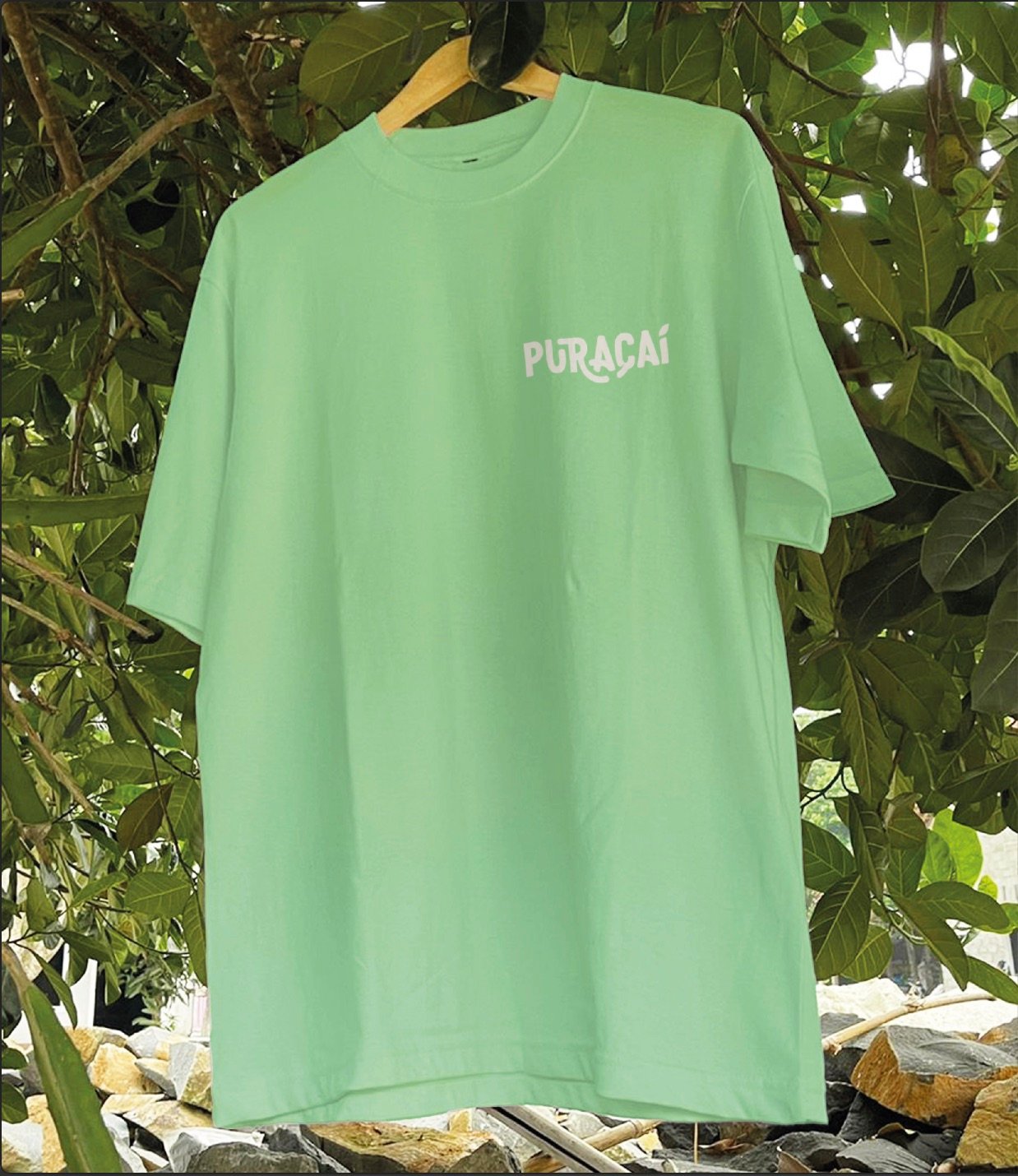 Camiseta verde con el logotipo de Puraçaí